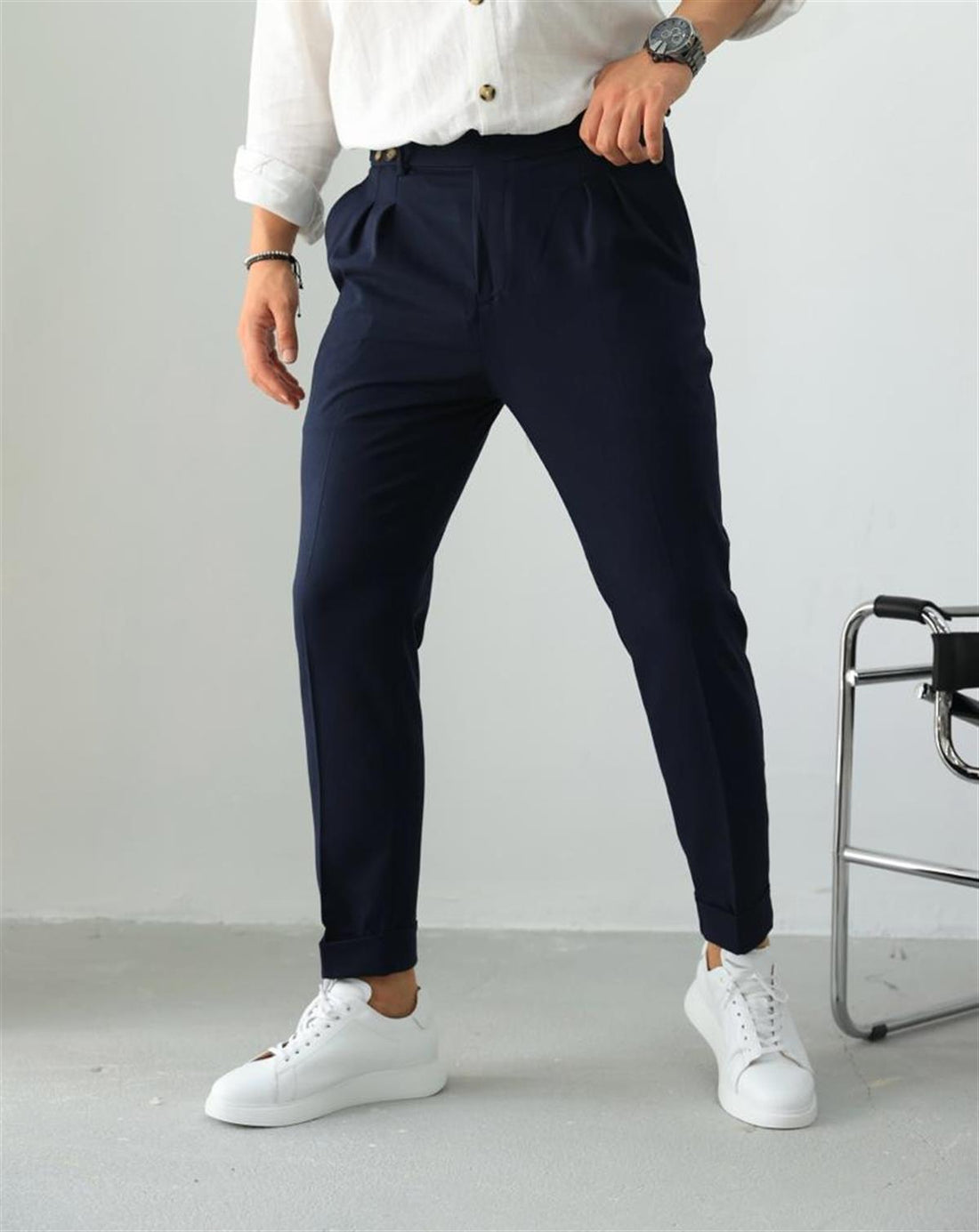 Pantalon plissé en tissu à double bouton